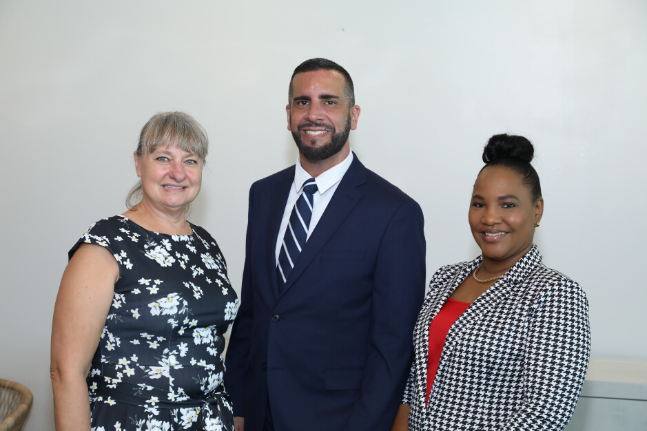 staff-photo (1) Executive director and staff smile